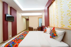 FabHotel Grand Gunas