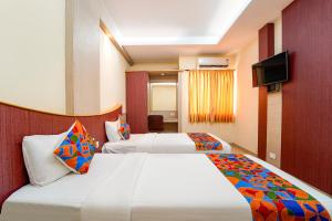 FabHotel Grand Gunas