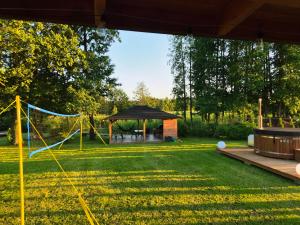 Domek Wypoczynkowy Zacisze w Makosiejach z dostępem do rzeki, z balią i jacuzzi