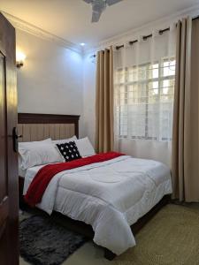 LosimStays Luxury 1-Bedroom Apartment BnB Near Mlimani City Mall & University of Dar es Salaam