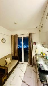 1BHK Highrise with Pool View on Dwarka Expressway MOKKA