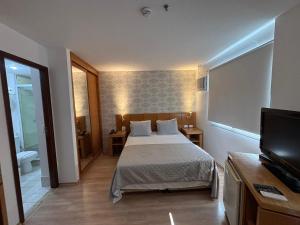 Hotel Vila Olimpia Itaim com garagem grátis e ar cond 2103