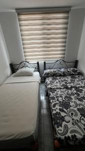 Apartamento familiar Ricaurte, con piscinas