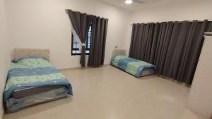 فيلا 4 غرف و5 حمامات عوقد الشمالية-Villa in Awqad