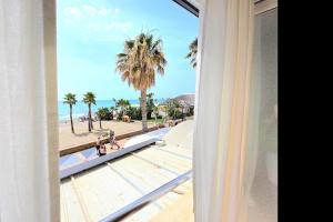 Paseo Marítimo Rainbow Oasis Beachfront 2 bed apartment