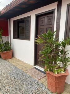 Chalé Raízes da Ilha com copa e Ar Condicionado