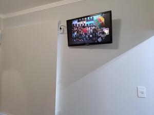 Apartamento em um prédio em frente à praia de Santos