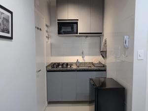 Apartamento em um prédio em frente à praia de Santos