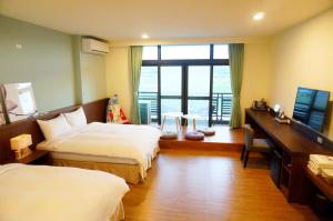 Phòng Bốn Người Có Phòng Tắm Riêng (Quadruple Room with Private Bathroom)