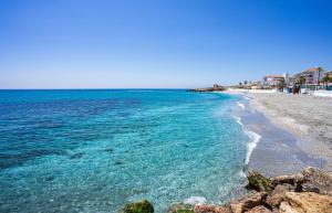 Apartment in Nerja with Pool & Private Parking
