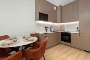 Beige and Blue Apartment in Gdańsk with Garden and Parking by Noclegi Renters
