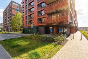 Beige and Blue Apartment in Gdańsk with Garden and Parking by Noclegi Renters