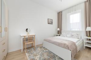 Beige Apartments By the River in Szczecin with Balconies by Noclegi Renters