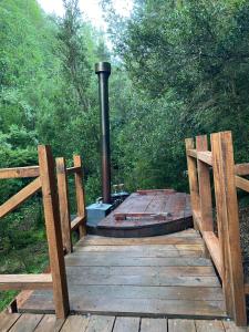 Refugio Minicabaña en medio del bosque con Tinaja opcional
