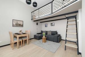 Functional Air-Conditioned Studio with a Mezzanine by Noclegi Renters