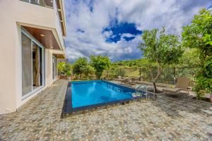 ELIVAAS Signature RK Villa 4-BHK Hideaway with Private Pool, Close to Korigad Fort