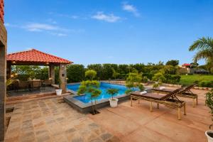 ELIVAAS Signature Royal Green Farm Pet-friendly 2-BHK Countryside Farmhouse with Private Pool, Gazebo and Garden