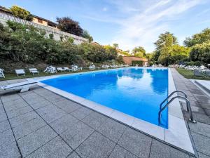 Apartment Lake & Pool by Interhome