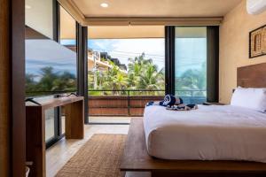 BT Homes - Tankah Bay Tulum - Exclusivos apartamentos con piscina a metros del mar