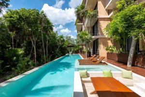 BT Homes - Tankah Bay Tulum - Exclusivos apartamentos con piscina a metros del mar