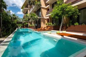 BT Homes - Tankah Bay Tulum - Exclusivos apartamentos con piscina a metros del mar