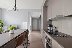 Stunning 1BR Suite Private Balcony & City Views