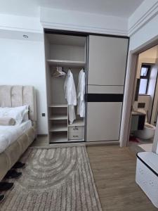 newly furnished three bedroom apartment with swimming pool, fully equipped gym, private parking space ,children playground and unbeatable scenic city views