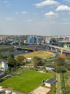 Casa De Luxe 2 Bedroom Apartment on Mombasa rd Near JKIA Airport and SGR, With a Pool, Gym and Next to a Mall, Close to Emara Olesereni & Eka Hotel