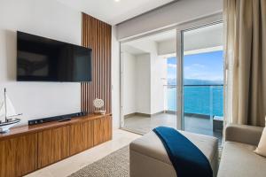 Oceanfront 1BR Puerto Vallarta condo w pool, gym
