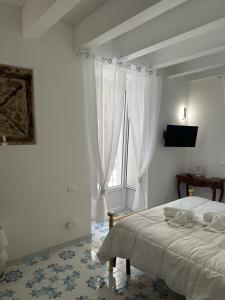 Casa Angelieri Apartments & Rooms