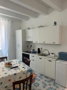 Casa Angelieri Apartments & Rooms