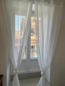 Casa Angelieri Apartments & Rooms