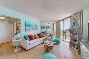 Gulf-view resort condo with pool hot tubs & over-street beach access
