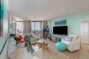Gulf-view resort condo with pool hot tubs & over-street beach access