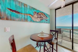 Gulf-view resort condo with pool hot tubs & over-street beach access