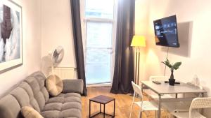 Cozy 1BR Apt with Living Room & Garden Included