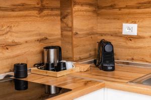 GreAnn Beachfront Comfort Modern 2BR Retreat by PikHost