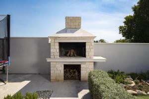 Ferienhaus Georgine mit Pool