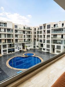 Modern 2BR with Pool View at Agadir Bay Prime Spot
