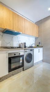 Appartement Cosy Mghogha 11min Place