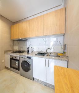 Appartement Cosy Mghogha 11min Place