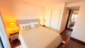 Seaside one bedroom apartment with terraces, garage & swimming pool