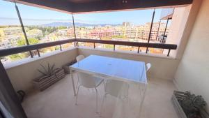 Seaside one bedroom apartment with terraces, garage & swimming pool