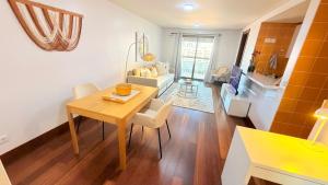 Seaside one bedroom apartment with terraces, garage & swimming pool