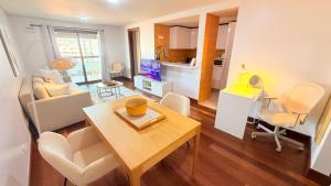 Seaside one bedroom apartment with terraces, garage & swimming pool