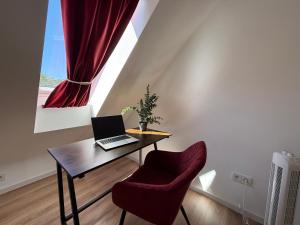 Apartment mit Arbeitsplatz, Parkplatz & Terrasse - für 4