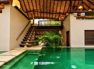 Casa KUUL, elegant fusion of house and garden.