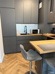Apartment Royal Wilanów with gym, sauna and private parking space