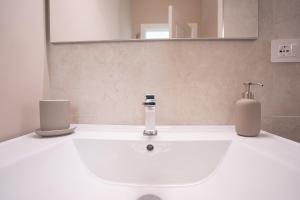 Le Tre Donne Boutique Apartment by Frantoi Sama