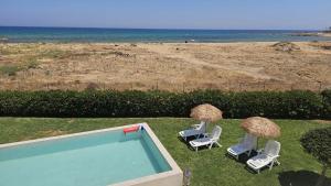Mariella Rooms beach front with seaview and pool and garden